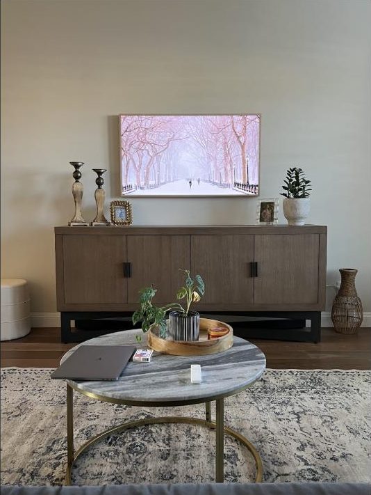 Frame-style TV installed flush to the wall by Kalieb Designs
